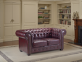 Luxurious Oxblood Red Chesterfield 2-Seater Sofa with Buttoned Design & Scroll Arms